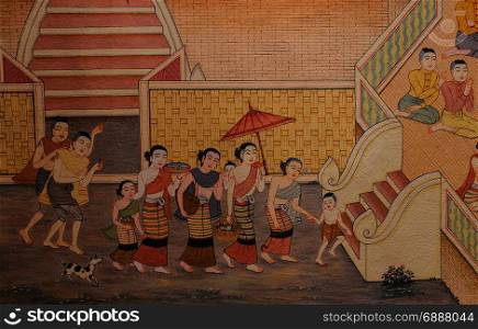 Thai mural painting of Lanna people life in the past on temple wall in Chiang Rai, Thailand