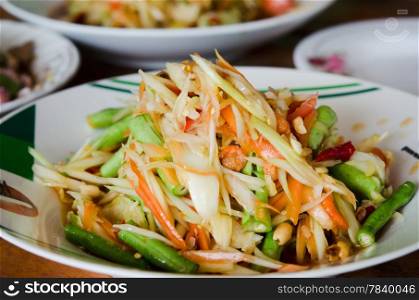 thai papaya salad , spicy , mixed from variety of vegetable