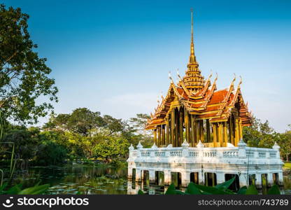 Thai pavilion at center of lotus pond with blue sky,Bangkok Thailand