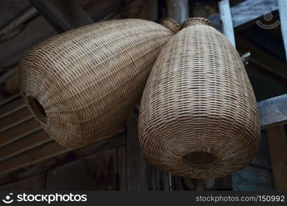 Thai style - antique bamboo fishing tools at bamboo cottage