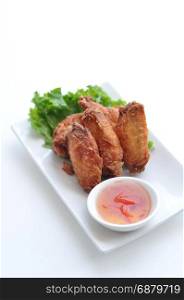 Thai Style Chicken Wings. Crispy chicken wings, marinated chicken wings with Thai herb. Served with hot sweet & sour sauce.