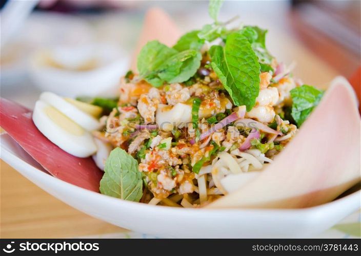 thai style cuisine, Spicy shrimp on a salad with eggs and minced pork