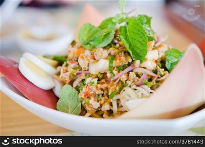 thai style cuisine, Spicy shrimp on a salad with eggs and minced pork