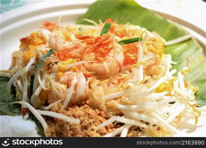 Thai style food, Pad Thai placed on banana leaves, use paper plates, biodegradable.