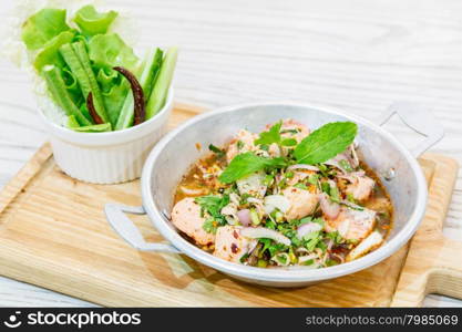 Thai Style Spicy Salmon salad with fresh vegetable