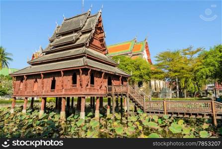 Thai wooden temple of Wat Thung Si Muang in Ubon Ratchathani, Thailand