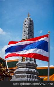 Thailand flag and Buddhist temple Wat Pho. Bangkok, Thailand