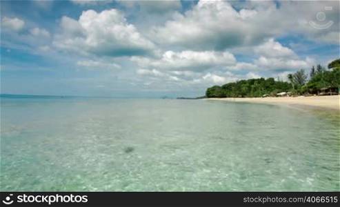 Thailand island beach with clear waves