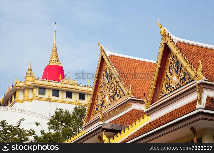 Thailand Wat temple and pagoda roof set on high. Dignitaries at the place of Buddhism.