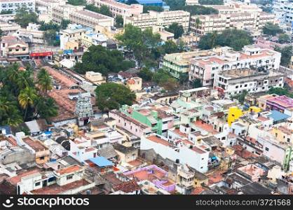 Thanjavur (Trichy) city. Cityscape of crowded Indian city with bright colored houses. South India, Tamil Nadu
