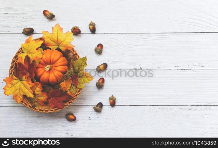 Thanksgiving background frame autumn leaf decoration festive on wooden / Autumn table setting with pumpkins on basket on wooden