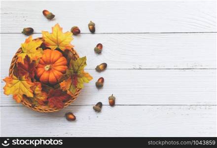 Thanksgiving background frame autumn leaf decoration festive on wooden / Autumn table setting with pumpkins on basket on wooden