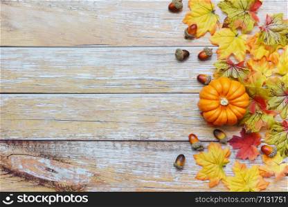 Thanksgiving background frame autumn leaf decoration festive on wooden / Autumn table setting with pumpkins holiday