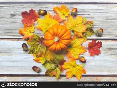 Thanksgiving background frame autumn leaf decoration festive on wooden / Autumn table setting with pumpkins holiday
