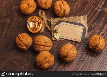 Thanksgiving Day nuts on the dark background. Thanksgiving Day nuts on the wooden background
