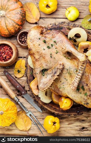 Thanksgiving whole duck on rustic wooden background. Baked duck for Thanksgiving Day