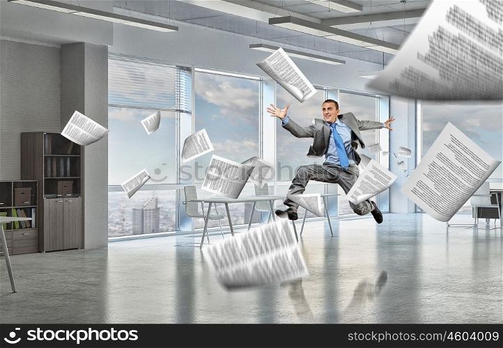 That feeling of freedom. Happy young businessman running away from office