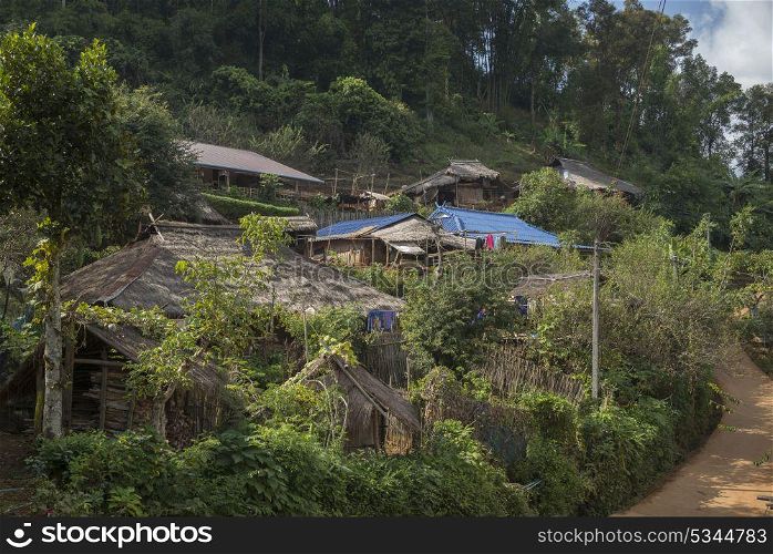 Thatched roofed houses in village in mountainous area, Chiang Rai, Thailand