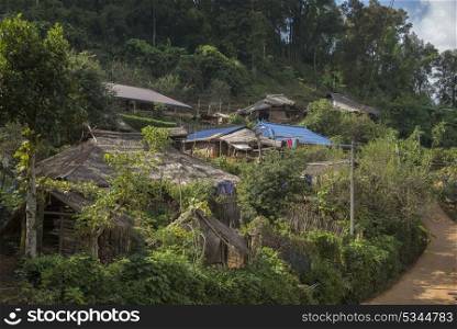 Thatched roofed houses in village in mountainous area, Chiang Rai, Thailand