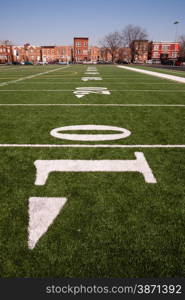 The 10 yard line on an inner city gaming field