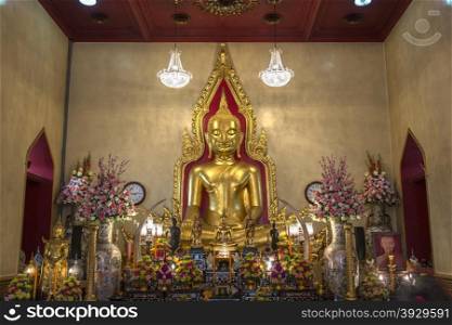 The 13th century solid gold Buddha within Wat Traimit in the Chinatown area of Bangkok in Thailand.