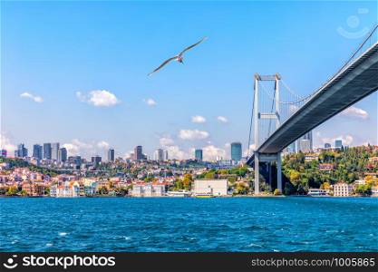 The 15 July Martyrs Bridge or the Bosphorus Bridge and modern Istanbul view.. The 15 July Martyrs Bridge or the Bosphorus Bridge and modern Istanbul view