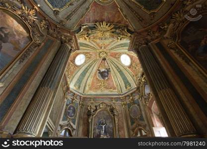 The 18th century Queluz National Palace is one of the last great Rococo buildings to be designed in Europe. In the picture, detail of the ceiling of the chapel?s main altar.