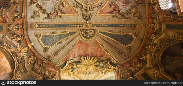 The 18th century Queluz National Palace is one of the last great Rococo buildings to be designed in Europe. In the picture, detail of the ceiling of the royal chapel.