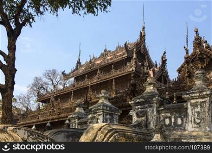 The 19th Century wooden buildings of the Shwe Nandew Monastery in Amarapura near Mandalay in Myanmar.