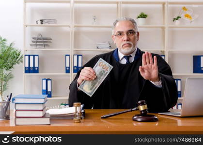 The aged lawyer working in the courthouse. Aged lawyer working in the courthouse