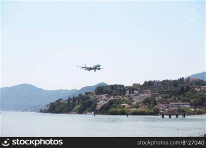 the airplane is landing in Kerkyra. Corfu Island in Greece 