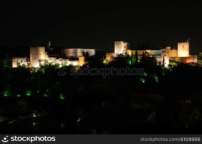 The Alhambra lit at night, Granada, Andalusia, Spain