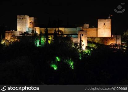 The Alhambra lit at night, Granada, Andalusia, Spain