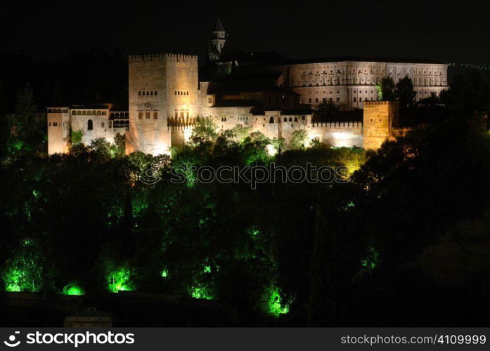 The Alhambra lit at night, Granada, Andalusia, Spain