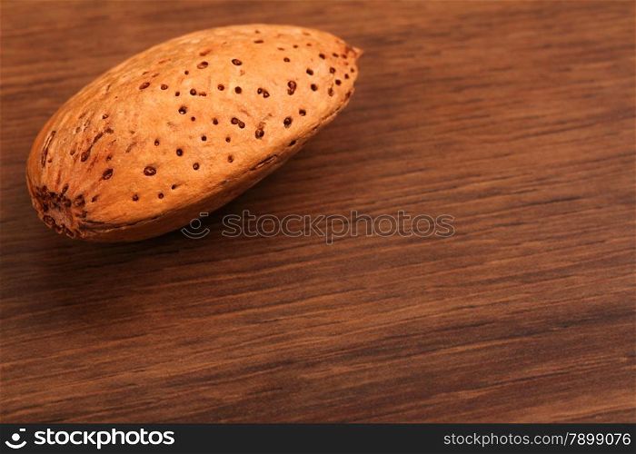 The Almond isolated on the wood