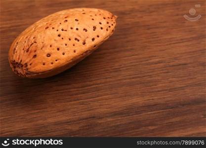 The Almond isolated on the wood