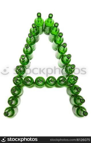 The alphabet from glass beer bottles. Letter A