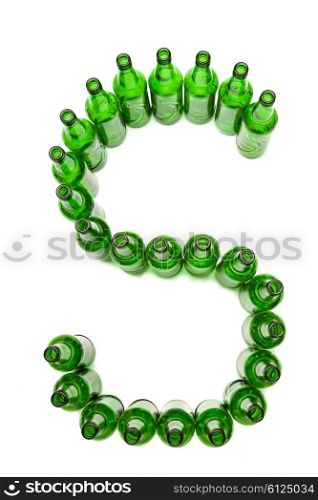The alphabet from glass beer bottles. Letter S