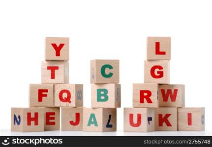 The alphabet. Letters drawn on wooden cubes. A children&rsquo;s toy