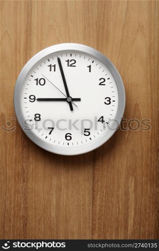 The aluminum wall clock is almost nine