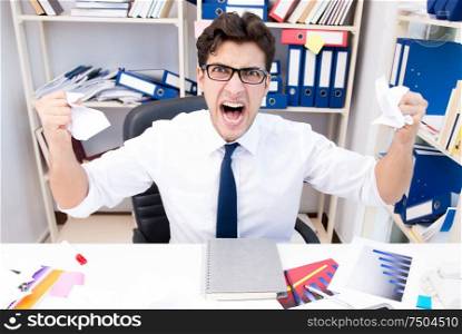 The angry and scary businessman in the office. Angry and scary businessman in the office