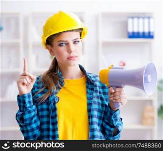 The angry building supervisor with megaphone. Angry building supervisor with megaphone