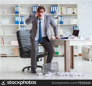 The angry businessman shocked working in the office fired sacked. Angry businessman shocked working in the office fired sacked
