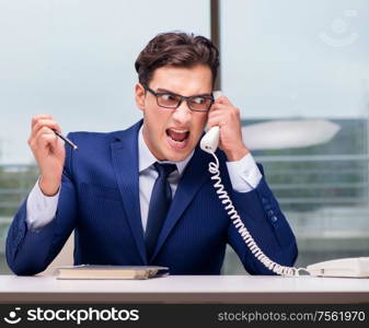 The angry call center employee yelling at customer. Angry call center employee yelling at customer