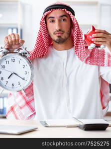 The arab businessman working in the office. Arab businessman working in the office