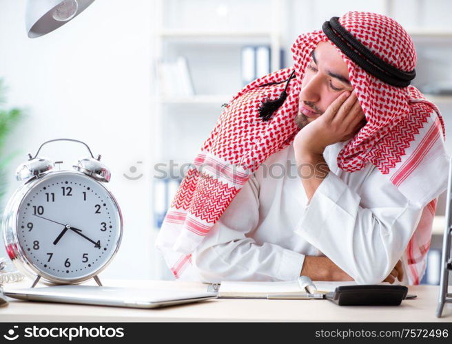 The arab businessman working in the office. Arab businessman working in the office