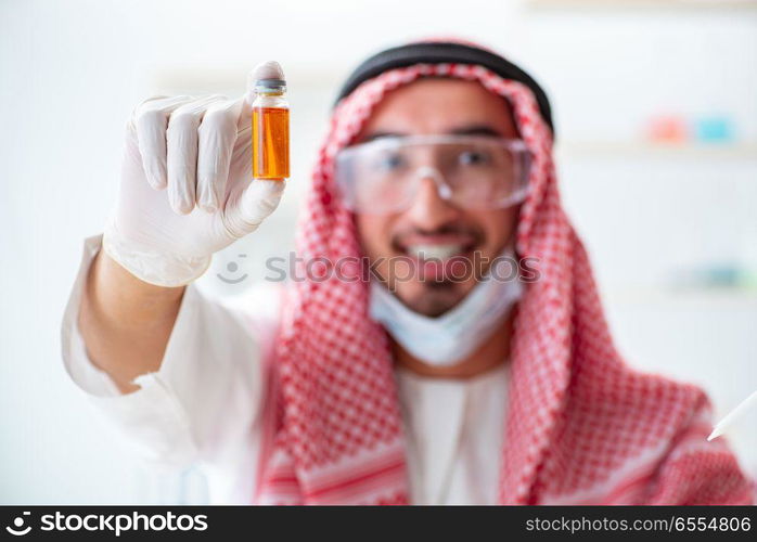 The arab chemist working in the lab office. Arab chemist working in the lab office