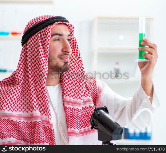 The arab chemist working in the lab office. Arab chemist working in the lab office