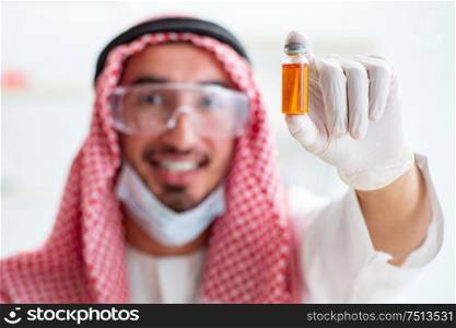 The arab chemist working in the lab office. Arab chemist working in the lab office