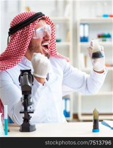 The arab chemist working in the lab office. Arab chemist working in the lab office